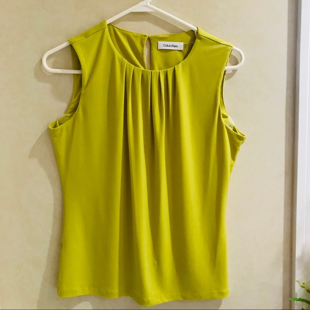Calvin Klein’s green blouse